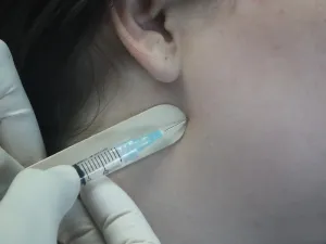 close up of person getting an injection