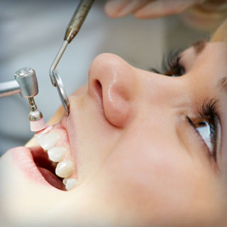 close up of a woman in a dental chair